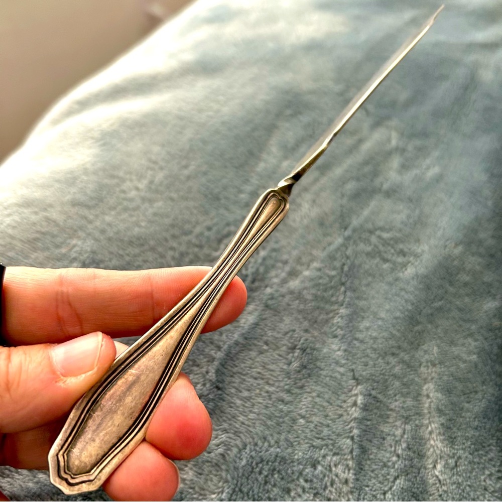 Wm A. Rogers Twisted Handle Butter Knife